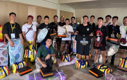 Angeles distributes sports equipment to AC student-athletes