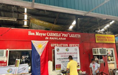 AC gov’t installs National Heroes Day adornments in city hall offices